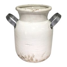 an old white vase with two handles on the top and bottom, is shown against a white background