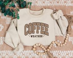 Coffee Weather Sweatshirt, Coffee Sweater for Women, Winter Season Sweatshirt, Lovely Gift for Coffee Lover, Trendy Autumn Coffee Sweater Discover our premium, ultra-soft, and cozy sweatshirts--perfect for you and your loved ones! Enjoy a relaxed, casual fit that's both stylish and comfortable. These sweatshirts are made from high-quality brands, with no compromises on quality! We appreciate your support for our small business, and we hope you have a great shopping experience! 🎁 For any questions or custom order inquiries, feel free to reach out! 💌 How to Order: Review All Photos: Please take a moment to view all the images. Select Size and Color: Use the drop-down menus to make your selections. Add to Cart: Click "Add to Cart." You can continue shopping for more items if you'd like. Pro Sweater For Women Winter, Gift For Coffee Lover, Coffee Sweater, Sweater For Women, Autumn Coffee, Cozy Sweatshirts, Coffee Lover Gifts, Casual Fit, Casual Fits