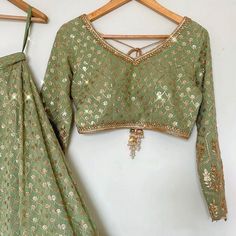 Green And Gold Lehenga Top Size Large Never Worn Skirt Not Included Festive Green Choli For Spring, Spring Festive Green Choli, Traditional Green Choli For Spring, Bollywood Style Green Choli For Spring, Traditional Green Lehenga For Spring, Spring Party Green Lehenga, Green Festive Summer Skirt, Green Festive Skirt For Summer, Festive Green Summer Skirt