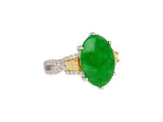 "Item Details: - Type: Cocktail Ring - Metal: 18K White, Yellow Gold  - Weight: 5.66 Grams  - Style: Interlocking  - Setting: Prong - Size: 6  - Measurements: 2.5 x 2 CM  Center Stone Details:    - Type: Jadeite Jade - Carat: 4.76 - Cut: Cabochon, Oval - Color: Green  - Measurements: 16 x 10.15 mm  Side Stone Details(1):  - Type: Diamond  - Color: Yellow  - Carat: 0.44 CTTW - Cut: Trapezoid - Quantity: 2  - Measurement: 4 x 3.5 mm  Side Stone Details(2):  - Type: Diamond  - Carat: 0.34 CTTW - Cu Green Multi-stone Oval Diamond Ring, Oval Green Multi-stone Diamond Ring, Green Oval Multi-stone Diamond Ring, Oval Green Diamond Ring Hallmarked, Oval Green Hallmarked Diamond Ring, Hallmarked Green Oval Diamond Ring, Green Multi-stone Marquise Jewelry, Side Stone Ring, Split Shank Ring