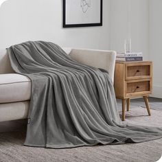 a couch with a blanket on top of it