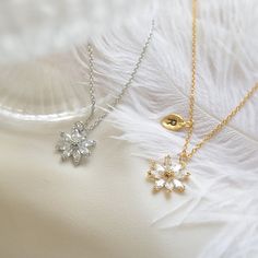 Super Sparkling Personalized Daisy necklace. ♥ Material - Gold and White gold plated over brass, Clear stone ♥ The chain length - 12 ~ 20 inches (adjustable chain) ♥ Pendant Measurement - 13mm ♥ The matching earrings available as below. https://www.etsy.com/listing/1622805588 ♥ All the jewelry comes with gift wrap ♥ Please check the shop policy before you buy the products. Silver Necklace With Adjustable Chain For Bridesmaid, Silver Clavicle Chain Necklace For Bridesmaids, White Gold Crystal Necklace Gift, Silver Crystal Necklace With Delicate Chain As Gift, Silver Cubic Zirconia Necklace For Bridesmaid, Wedding Flower Pendant Charm Necklace With Delicate Chain, Silver Charm Necklaces With Adjustable Chain For Weddings, Silver Flower Necklace With Delicate Chain For Wedding, Cubic Zirconia Bridal Necklace Gift