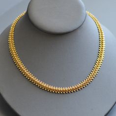 "A stunning antique Victorian Etruscan Revival period (1860-1880) fancy woven 18k yellow gold necklace. This beautiful antique necklace is wrought with amazing tiny details like woven gold lace and even the clasp is embellished. It is weighty and the same width throughout with a nice slinky feel that feels great when worn and retains it's original secure clasp and safety chain. Hallmarked for 18k gold. Chain length approximately : 16.75\" Chain width approximately: 8.75mm Weight: 26.4g This piec Gold Plain Necklace, Plain Chain Designs Gold, Antique Choker Designs Gold, Plain Gold Necklace Designs, Short Chains Gold, Rani Haram Designs Gold, Thushi Necklace Gold, Short Necklace Designs Gold, Gold Short Necklace Designs