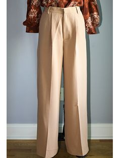 FEATURES Elegant, Classy & Chic High Waisted Wide Leg Pants The wide-leg trouser is a flattering and chic silhouette designed to flatter your shape. Adding a front pleat and pockets, these trousers have a relaxed but tailored construction. Button/zip fly closure with front button, zipper fly, and belt loops. FABRIC 78% Polyester, 18% Rayon, and 4% Spandex Imported SIZE + FIT Sizing is True to Size | Tapered Fit with minimal stretch Size Bust Waist Hip Small (2-4) 36” - 37” 27” – 28” 36” – 37 Fall Wide Leg Dress Pants With Pressed Crease, Elegant Wide Leg Pants For Office, Elegant Wide Leg Ankle-length Pants For Formal Occasions, Elegant Wide Leg Ankle-length Pants For Formal Events, Semi-formal Fall High-waisted Dress Pants, Fall Semi-formal High-waisted Dress Pants, Semi-formal High-waisted Dress Pants For Fall, Elegant Wide Leg Pants For Semi-formal Occasions, Elegant Ankle-length Wide Leg Pants For Formal Occasions