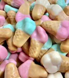 a pile of candy filled with marshmallows on top of each other