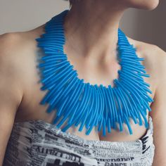 Chic statement blue necklace. You will love wearing this jewelry piece for special occasions. The necklace is possible also in magenta, black and royal blue. MATERIALS: Rubber cord MEASHUREMENTS: Bib: 24 cm x 10 cm or 9,44" x 3,9" Necklace length 60 cm or 23,6" HOW TO CARE: Keep jewelry in individual zip lock bags. Avoid mechanical impact and contact with cosmetics. If necessary, wipe the spot with napkin.  PACKAGE: All jewelry are sent in PVC storage bag with branded sticker. Don't hesitate to Handmade Bold Blue Jewelry, Bold Handmade Blue Jewelry, Elegant Blue Bib Necklace For Party, Bold Blue Jewelry For Party, Quirky Ring, Pvc Storage, Bib Necklaces, Chic Jewelry, Blue Necklace