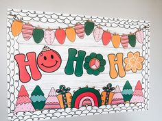 a sign that says ho ho ho with lots of decorations on the front and sides