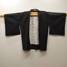 This is beautiful Japanese Silk Black Kimono with Lovely Orange Painted Flowers on the back. A wonderful cultural item to wear for all occasions that makes a statement! You can wear Kimono's with slacks, jeans, dresses and skirts. A truly unique gift to give to man or woman. ONE SIZE FITS ALL 32 INCHES LONG 23 INCHES WIDE 25 INCH SLEEVE LENGTH 100% SILK AND WASH BY HAND AT BACARA WE STAND BEHIND ALL OF OUR MERCHANDISE. FULL MONEY BACK GUARANTEE WILL BE PROVIDED FOR DISSATISFIED CUSTOMERS. YOUR S Mahogany Hair, Flower Kimono, Kimono Japanese, Black Kimono, Japanese Silk, Painted Flowers, Orange Flower, Orange Flowers, Kimonos