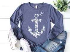 This nautical shirt is a long sleeve shirt with a button up front and anchor print on the back. Perfect for any sailor, boat captain, or marine-at-heart. This comfortable t-shirt will be your and your friends' favorite! Be simple, be different! - Long Sleeve Shirt - Youth - Toddler - Unisex M A T E R I A L S → All our simple color ones like White and Black are 100% Cotton. → All our Heathered Colors are cotton/polyester blend and they are super comfy soft! → Bella-Canvas Unisex Jersey Long Sleev Nautical Cotton Tops For Fall, Nautical Long Sleeve Tops For Summer, Nautical Style Long Sleeve Summer Tops, Navy Long Sleeve Summer T-shirt, Nautical Shirt, Halloween Shirts Kids, Witch Sweatshirt, Gifts For Sailors, Boat Captain