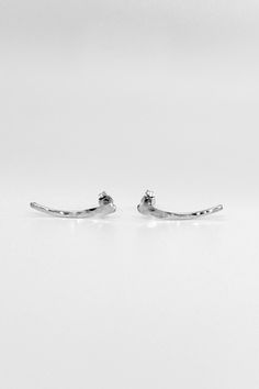 These little Ear Climbers in Sterling Silver are incredibly sleek and stylish, with a fit so comfortable you'll forget you're even wearing them! You can now choose from either SMOOTH for a slightly faceted, reflective finish or HAMMERED for a sparkling, textured finish. Each earring will come with a classic ear nut backing. Choose ONE SINGLE CLIMBER (specify which ear) or a PAIR. Each Climber measures approximately 1 inch. Also available in 14K Gold Fill or 14K Rose Gold Fill metal. Handmade to Everyday White Gold Sterling Silver Ear Climbers, Silver Curved Barbell Earrings For Gift, Minimalist Nickel-free Ear Climbers For Everyday, Everyday Minimalist Nickel-free Ear Climbers, Minimalist Silver Curved Barbell Jewelry, Minimalist White Gold Sterling Silver Ear Climbers, Minimalist Sterling Silver Nickel-free Ear Climbers, Minimalist Sterling Silver Single Ear Climber, Dainty Sterling Silver Single Ear Climber