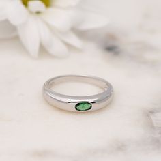 Elegant dome ring with a minimalist emerald center stone is the perfect statement piece. It's dainty and pairs well with other rings. D E T A I L S ▫︎ Made of High Quality 925 Sterling Silver ▫︎ Finish: Thick Plating of 14k Gold or Rhodium ▫︎ Dimensions: 4.5 mm in Height ▫︎ Available in Sizes 4 - 10 ▫︎ Made with the highest grade of cubic zirconia stone for an authentic look ▫︎ Also available in White CZ center stone https://www.etsy.com/listing/876281908/minimalist-dome-ring-gold-ring-chunky?ga Modern Emerald Ring With Polished Finish For Promise, Modern Emerald Promise Ring With Polished Finish, Modern Signet Ring With Birthstone For Promise, Minimalist Oval Emerald Ring With Bezel Setting, Minimalist Emerald Cut May Birthstone Ring, Green Minimalist Signet Ring For Anniversary, Minimalist May Birthstone Ring With Emerald Cut, Everyday Minimalist Emerald Cut Ring, Everyday Minimalist Emerald Ring