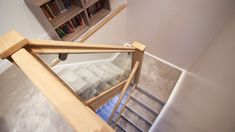 The new stairway to the loft-space meshes seamlessly with the existing property. The grey carpet of this upper staircase perfectly complements the tinted blue shades below. Loft Space, Grey Carpet, Loft Spaces, The Grey, Home Improvement Projects