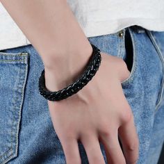 Look stylish, modern, and classy wearing this Black Stainless Steel and Leather Bracelet! The bracelet is carefully crafted out of high-quality stainless steel metal and leather that is perfectly safe to wear, feels great on the skin, and lasts for years. It looks classy and fashionable with the weave pattern and plate design. It can also be worn as an accessory to go with any type of outfits, regardless of occasions. It looks similar to the watch wristband that nobody would suspect it is a bracelet. It makes a great gift for your friends and family members on any special occasion! Specification: Material: Stainless Steel & Leather Hypoallergenic: Lead and Nickel Free Design: Weave and Black Metal Clasp: Hidden Clasp Closure Casual Black Leather Wristband, Black Leather Casual Wristband, Black Leather Bracelet Suitable As A Gift, Modern Black Leather Strap Wristband, Black Stainless Steel Wristband, Modern Black Leather Bracelet With Stainless Steel Clasp, Modern Stainless Steel Leather Bracelet With Black Band, Black Stainless Steel Bracelet Wristband, Modern Leather Bracelet With Metal Black Band