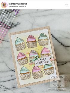 a handmade card with cupcakes on it