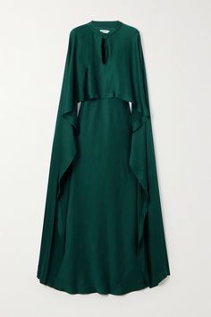 SIMKHAI's 'Amory' gown is designed with a dramatic cape-effect panel that cascades beautifully over the shoulders and trails behind you as you walk. It's made from emerald satin and has a keyhole neckline and floaty hem. Wear yours with drop earrings and sparkling sandals. One Side Cape Dress, Green Cape Dress, Profile Hijab, Dune Fashion, Fall Gowns, Dark Green Fashion, Desert Witch, Modest Evening Gowns, Dress With Cape