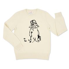 Introducing the adult version of our beloved Paddington Coming and Going Sweater! Inspired by the timeless illustrations in A Bear Called Paddington, this sweater captures the heartwarming essence of the iconic little bear from Peru with his suitcase and big hat.  Made from 100% cotton, this unisex long sleeve sweater has a soft hand and comfortable fit. The mid-weight knit is seasonless and not bulky. Whether you're relaxing at home, strolling through the city, or embarking on your own exciting journey, the Paddington Coming and Going Sweater wraps you in warmth, nostalgia, and a touch of magic. This adult sweater pairs perfectly with our kids Paddington Coming and Going Sweater for a matching set sure to bring smiles and cherished memories: https://www.etsy.com/listing/1242553331/padding Classic Beige Cotton Sweater, Classic Cream Cotton Sweater, Beige Cotton Vintage Sweater, Vintage Beige Cotton Sweater, Bear Sweater, Paddington Bear, Big Hat, Little Bear, Wrap Sweater