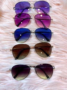 Our new Aviator Sunglasses are such a hot accessory for your next beach or lake vacation! Colored lenses. Blocks 100% UVA/UVB rays. Available in Pink, Purple, Blue, Black, Brown. Black Aviator Sunglasses, Lake Vacation, Pink Purple Blue, Aviator Sunglasses, Pink Purple, Blue Black, Lenses, Lake, Sunglasses