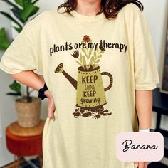 Plants Are My Therapy - Comfort Colors 1717 T-Shirt for Gardeners and Plant Lovers Embrace your green thumb and showcase your love for all things botanical with our "Plants Are My Therapy" t-shirt! Perfect for gardeners and plant enthusiasts, this tee is made from the super-soft, high-quality Comfort Colors 1717 fabric, ensuring you stay comfortable while tending to your garden or relaxing with your favorite potted friends. 🌱 Product Features: Premium Comfort Colors 1717: Known for its superior Casual T-shirt For Gardening In Spring, Relaxed Fit T-shirt For Gardening In Spring, Casual Spring T-shirt For Gardening, Green Graphic Print T-shirt For Gardening, Short Sleeve T-shirt With Plants Print For Gardening, Cotton Graphic Print T-shirt For Gardening, Spring Short Sleeve T-shirt For Gardening, Cotton T-shirt With Graphic Print For Gardening, Cotton T-shirt With Letter Print For Gardening