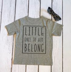 This toddler tee is handmade by me using HTV and applied with a commercial heat press. The design, Little Ones to Him Belong, is pressed on the shirt using vinyl. Sizing Info: 12-18 month 18-24 month 2T 3T 4T 5T Runs true to size - This is a toddler boy/unisex style tee so keep in mind when ordinary size. My processing time for all orders is 3-5 days (not including shipping time). *USPS does not always track the package properly. Do not be alarmed if you can't see the movement as it moves across Toddler Christian Shirts, Christian Shirts For Kids, Toddler Cricut Shirts, Toddler Shirt Ideas, Toddler Boy Shirts, Toddler Graphic Tee, Christian Shirts Designs, Cute Shirt Designs, Boys Graphic Tee