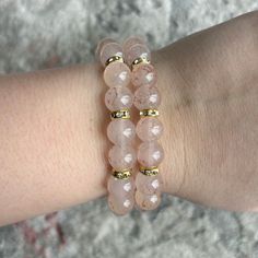 Stretch bracelet with round stone beads. Casual Beaded Agate Bracelets, Elegant Round Crystal Bracelet With 8mm Beads, Elegant 8mm Beaded Crystal Bracelet, Adjustable Rose Quartz Jewelry With 8mm Beads, Adjustable Rose Quartz Beaded Jewelry, Casual Pink Bracelets With Natural Stones, Healing Adjustable Bracelets With Faceted Beads, Spiritual Faceted Crystal Bangle Bracelet, Adjustable Rondelle Crystal Bracelet With 8mm Beads