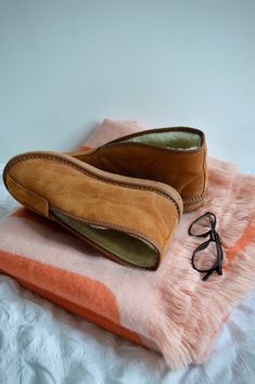 Step into comfort with our Women's Slipper Boots, the ideal choice for any weather. These boots are not just footwear; they are a testament to quality and craftsmanship. The exterior, crafted from premium suede, provides a stylish and durable finish. Inside, your feet will be caressed by a luxurious lining made from a blend of sheep wool, ensuring warmth and comfort with every step. Boots are true to size. Please size up if you are between the sizes. Brown Slippers, Sheepskin Slippers, Glad Rags, Suede Slippers, Kids Slippers, Boots Uk, Tan Suede, Slipper Boots, Mens Slippers