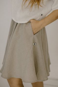 This knee-length flowy linen skirt has deep pockets and an elastic waist for your everyday comfort.Qualities of this casual linen circle skirt:- made from Oeko-Tex certified 100 % European linen fabric which guarantees you that it meets human - ecological requirements. The linen fabric is of medium weight (185 g).- Wide elastic waistband.- if your feel that you need to add extra length - do not hesitate to contact us. - color in the picture - Sand brown (beige). Please choose any other color on Beige Linen Bohemian Skirt, Bohemian Beige Linen Skirt, Bohemian Linen Flared Skirt, Bohemian Flared Linen Skirt, Relaxed Linen Mini Skirt, Flowy Linen Mini Skirt, Relaxed Fit Linen Mini Skirt, Beige Linen Pleated Skirt, Linen Mini Skirt With Lining