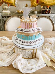 a cake sitting on top of a wooden table