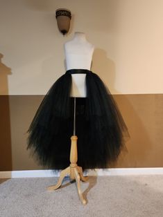 I CAN MAKE THIS TUTU IN ANY COLOR AND SIZE, PLEASE NOTE THE EXACT TULLE AND RIBBON COLOR AT CHECK OUT (Without note I will make it same color with 1st list photo in black front open hi lo tutu). 1ST PHOTO TUTU LENGTH FRONT 20'' KNEE LENGTH, BACK 44'' FLOOR LENGTH, FOR HEIGHT AROUND 5'3'' wear a couple inches of heels . This tutu is made with 200-400 yards of 6'' wide fine tulle so it's super full. Stretchy waist along with a big ribbon bow ties on the waist. (I might use 2''or 1.5'' ribbon depen Fitted Tulle Bottoms For Prom, Fitted Tulle Skirt Bottoms For Prom, Stretch Tulle Petticoat For Halloween, Halloween Stretch Tulle Petticoat, Fitted Tulle Bottoms For Party, Halloween Fitted Tulle Petticoat, Black Tulle Tutu Dress For Prom, Black Tulle Skirt For Costume Party, Black Tulle Party Bottoms