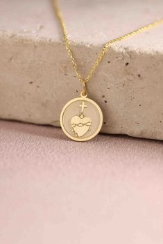 Gold Sacred Heart Pendant - Sacred Heart Gold Necklace ● Material of pendant: Solid Gold 14k ( REAL GOLD ) ● Metal Stamp: 14k ( REAL GOLD ) ● The pendant is available in 5 sizes: - 12,7 mm / 0.5 inches (Diameter) - 14,0 mm / 0,55 inches ( Diameter ) In the photos - 15,3 mm / 0.6 inches ( Diameter ) - 16,5 mm / 0,65 inches ( Diameter ) - 19,1 mm / 0,75 inches ( Diameter ) ( In the photos the size is 14mm / 0.55 inches Diameter ) ( Jump Ring inner diameter: 4 mm ) ● Material of chain: Solid gold 1 Sacred Heart Necklace, Sacred Jewelry, Jewelry Heart, Heart Of Jesus, Gold Heart Necklace, Sacred Heart, Metal Stamping, Real Gold, Heart Charm