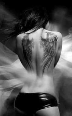 a woman with wings on her back