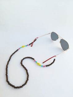 glasses chain, glasses chain for woman, eyeglass cord, boho eyeglass chain, sunglass holder, beaded glass strap, sunglasses cord, glass cord Handmade eyeglass holder.  The strap is 27 inches long, if you pretend another size please let me know :) Handmade with love :) Boho Eyeglasses, Sunglasses Cord, Glasses Chains, Sunglass Holder, Eyeglass Chain, Eyeglass Holder, Glasses Chain, Eye Wear Glasses, Eyewear Sunglasses