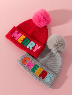 Deck the halls with style! With Shiraleah’s “Cheers” Beanie, your holiday spirit will be seen from head to toe. This adorable and festive winter hat is a chic grey color with a matching top pom detail, and features the word “Cheers” embroidered across the hem in vibrant multicolored lettering. Made from luxuriously soft and equally warm fabric, it’s the perfect accessory to brighten up your winter wardrobe. Pair with other items from Shiraleah’s Very Merry Collection to complete your look! Shira Coquette Diy, Toddler Girl Toys, Spa Wraps, Warm Fabric, Cozy Accessories, Cocktail Kits, Accessories Display, Grey Beanie, Perfume Gift Sets