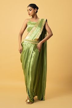 Green pre-draped saree with lace border. Comes with padded sequin embellished blouse and sequin embroidered belt. - Aza Fashions Festive Pre-draped Silk Saree, Fitted Pre-draped Art Silk Saree, Fitted Art Silk Pre-draped Saree, Festive Draped Choli, Festive Fitted Saree Draped Skirt, Green Pre-draped Saree With Border, Designer Green Pre-draped Saree With Embroidered Border, Green Embroidered Pre-draped Saree, Green Semi-stitched Embellished Saree