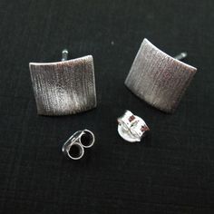 925 Sterling Silver Earrings Findings, Textured Tiny Square- 10mm-1 pair This listing is for 1 pair (2 pieces) of solid 925 sterling silver, Textured Square Ear wire. The earring posts are 20 gauge, 0.8mm The style of these findings is a downward grain texture that gives it some extra shine. The measurements of the ear wire are approximately 10mm long and 10mm wide. At the base of the square, there is a 2.8mm open ring, 0.9mm inner diameter ( so it fits 19 gauge rings and wire). Use this feature Silver Hallmarked Minimalist Earrings, Silver Minimalist Hallmarked Earrings, Classic Silver Earrings As Gift, Classic Silver Rectangular Earrings, Classic Silver Earrings For Gift, Minimalist Silver Earrings Stamped 925, Modern 925 Stamped Earrings For Anniversary, Minimalist Silver Earrings For Gift, Silver Minimalist Earrings