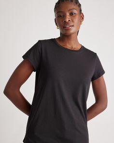 A wardrobe basic that feels anything but. Our Cotton Modal Crewneck Swing Tee is made with a super soft and stretchy cotton blend that's wrinkle-resistant with a seriously smooth finish.  | Quince | Women's Cotton Modal Crew Neck Swing T-Shirt in Black, Size XL, Cotton/Modal Basic Plain Tops For Loungewear, Essential Everyday Black Top, Essential Black Everyday Top, Plain Basic Tops For Everyday, Basic Stretch Cotton Tops, Classic Black Loungewear Tops, Simple Solid Tops For Loungewear, Basic Stretch Tops For Everyday, Simple Solid Color Tops For Loungewear