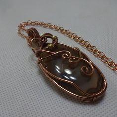 Artistic "Montana Agate" Handmade Wire-Wrapped Copper Pendant On A 18" Chain #658a All Of My Jewelry Is Handmade By Me In My Smoke & Pet Free Home!!!!!! Please Note That Every Item Purchased Comes In A Drawstring Organza Bag For Easy Gift Giving!!! Please Note That I Will Consider Any Reasonable Offer On My Jewelry!!!!!!!!!! Please Let Me Know If You Have Any Further Questions. Thanks For Stopping By And Have A Terrific Day!!!! Hand Wrapped Gold Agate Necklaces, Hand Wrapped Gold Agate Necklace, Handmade Chalcedony Jewelry Gift, Hand Wrapped Agate Jewelry Gift, Hand Wrapped Agate Jewelry For Gifts, Elegant Brown Copper Wire Jewelry, Handmade Bronze Agate Necklace, Artistic Agate Necklace As Gift, Artistic Agate Necklace Gift