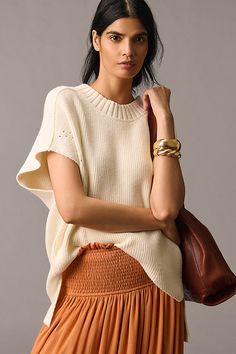 Add a touch of coziness to your close-knit circle with the Maeve Short-Sleeve Oversized Sweater, designed with a ribbed knit and a roomy, casual fit. | Short-Sleeve Oversized Sweater by Maeve in White, Women's, Size: 2XS, Polyester/Cotton/Wool at Anthropologie Chic Cashmere Sweater With Pointelle Knit, Everyday Relaxed Fit Chunky Knit Sweater, Everyday Chunky Knit Sweater In Relaxed Fit, Everyday Chunky Knit Sweater With Relaxed Fit, Slouchy Chic Chunky Knit Sweater, Cozy Textured Knit Top For Loungewear, Cozy Relaxed Fit Knit Top For Layering, Chic Sweater With Relaxed Fit For Everyday, Oversized Ribbed Knit Top For Fall