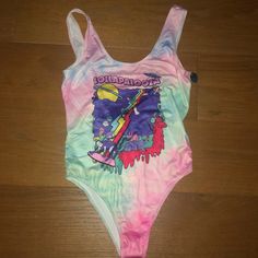 Lollapalooza Tyedye Bodysuit | New With Tags Beautiful Graphic And Pink And Blue Tyedye Size Small Never Worn, Perfect Condition Casual Tie Dye Swimwear For Poolside, Casual Tie-dye Swimwear For Poolside, Trendy Swimwear For Summer Music Festival, Trendy Summer Swimwear For Music Festival, Casual Tie Dye Swimwear For Swimming, Casual Swimwear For Spring Festivals, Casual Tie-dye Swimwear, Tie Dye Swimwear For Summer Pool Days, Summer Tie Dye Swimwear For Pool