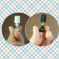 a person is holding a tiny bottle in their left hand and the other one has a small glass cap on it