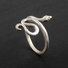 "Snake Ring, 925 Sterling Silver Snake Ring, Serpent Ring, Dainty Ring, Snake Jewelry, handmade ring, Gift For Her, Animal Ring ❥Silver Metal Specialty:- *Silver (Ag), chemical element, a white lustrous metal valued for its decorative beauty and electrical conductivity. Together with gold and platinum-group metals, silver is one of the so-called precious metals. Because of its comparative scarcity, brilliant white color, malleability, ductility, and resistance to atmospheric oxidation, silver ha Handmade Sterling Silver Snake Ring Gift, Handmade Sterling Silver Snake Ring, Handmade Symbolic Sterling Silver Snake Ring, Silver Hand Forged Snake Ring Gift, Handmade Sterling Silver Open Snake Ring, Hand Forged Silver Snake Ring Gift, Nickel-free Sterling Silver Snake Ring, Sterling Silver Snake Toe Ring As Gift, Nepal Jewelry