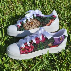 "A beautiful pair of hand-embroidered sneakers crafted by artisans. You're not just buying a comfortable pair of shoes, but also a design that only you will have, adding a touch of fashion uniqueness. They can be styled with jeans, shorts, dresses, and more. So, if you like them, simply add them & click \"Add to cart\" to make them yours. MATERIALS: White tennis shoes made of leather. Different colors of silk threads for the embroidered. Laces made of polyester, nylon, and cotton. Cobbler's glue Casual Embroidered Slip-on Sneakers, Embroidered Slip-on Sneakers For Summer, Summer Embroidered Slip-on Sneakers, Casual Sneakers With Custom Embroidery For Spring, Casual Custom Sneakers With Embroidered Logo And White Sole, Casual Custom Embroidery Lace-up Sneakers, Casual Sneakers With Multicolor Embroidery And Round Toe, Multicolor Embroidery Sneakers For Spring With Round Toe, Multicolor Embroidered Spring Sneakers With Round Toe