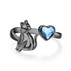 PRICES MAY VARY. 【Black Cat Design Concept】With the design of heart-shaped blue crystal adjustable rings for women, it is the best cat gifts for cat lovers 【Cat Ring Material】Made of 100% 925 sterling silver and blue crystal heart ring give it a sophisticated and stylish look. All the metals we use are lead free, nickel free and hypoallergenic 【Adjustable Rings for Women Size】 Ring width: 2.5mm, Weight: 3g. The open cat rings are easy to put on and comfortable to wear, and it won't fall off easi Silver Promise Ring With Cat Design, Silver Cat Design Promise Ring, Elegant Cat Design Ring Jewelry, Blue Crystal Ring, Cat Rings, Cat Rings Jewelry, Novelty Black Jewelry With Cat Design, Black Cat Jewelry, Silver Cat Ring