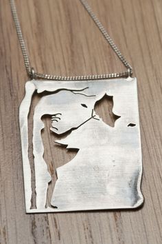 Girl in the wind silver necklace by NatashaWoodJewellery on Etsy Artistic Oxidized Silver Necklace, Silver Metal Necklace With Rectangular Pendant, Silver Necklace With Rectangular Metal Pendant, Artistic Engraved Silver Necklaces, Hand Forged Silver Rectangular Pendant Necklace, Artistic Silver Jewelry With Rectangular Pendant, Artistic Hand Forged Silver Jewelry, Jewellery Board, 3d Jewelry