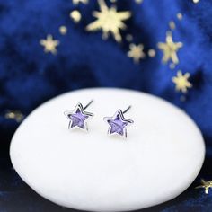 Amethyst Purple CZ Star Stud Earrings in Sterling Silver, Silver or Gold,  Sparkly Crystal Star Earrings, Stacking Earrings Sold as a pair.  Complete with sterling silver butterfly backs. Available in Clear CZ or sapphire blue CZ Dimensions : 7mm  Materials and Care: These are made of sterling silver with the option of 18ct gold coating. Only precious metals are used and they are hypoallergenic. They are tarnish resistant but please keep in a sealed plastic bag when not wearing.  Stamp: 925 SRS Cheap Purple Star-shaped Jewelry, Stacking Earrings, Earrings Stacking, Star Stud Earrings, Stacked Earrings, Purple Earrings, Star Earrings Stud, Crystal Stars, Silver Butterfly