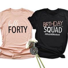 two t - shirts with the words birthday squad and wildflowers on them, one in pink and one in black