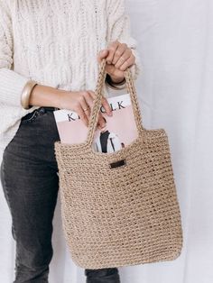 Casual, minimalistic bag with 100% natural jute twine. The bag is comfortable and practical, ideal for work, walks, the beach, for shopping.  It is ecological and natural, and will last a long time. * Minimalistic handbag. * Easy to care for. * Perfect for summer, autumn, winter and spring * Super strong  Perfect gift idea for her. Size : Height: 36cm (14,1 inches) Width 34cm (13.3 inches) Height with handles: 55 cm (21.6 inches) For the reason it is handmade, there might be a measurement differ Lightweight Natural Crochet Bag For Daily Use, Lightweight Everyday Jute Bag, Everyday Lightweight Jute Bag, Woven Burlap Tote Straw Bag, Lightweight Jute Bag In Natural Color, Handwoven Burlap Straw Bag In Natural Color, Everyday Lightweight Crochet Bag In Natural, Casual Summer Burlap Straw Bag, Lightweight Natural Jute Bag