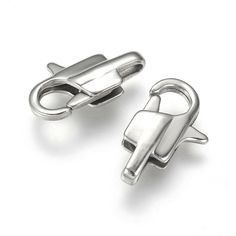 pair of metal clasps on white background with words pandahalli 1970 written below