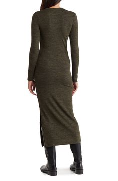 Daring side slits update the staple silhouette of this midi sweater dress sure to get compliments. 47" length Crew neck Long sleeves Slips on over head 53% viscose, 42% polyester, 5% elastane Machine wash, line dry Made in Turkey Model Stats: 5'10" height; 34" bust; 27" waist; 35" hips. Fall Stretch Midi Dress For Loungewear, Stretch Midi Dress For Fall Loungewear, Fall Workwear Midi Dress With Side Slits, Stretch Long Sleeve Midi Dress With Side Slits, Stretch Midi Dress With Side Slits And Long Sleeves, Long Viscose Dress For Fall, Fall Viscose Maxi Dress, Winter Bodycon Maxi Dress, Bodycon Midi Dress With Side Slits And Long Sleeves