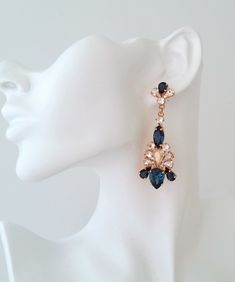 "✤ I can make these earrings with other colors to match your wedding party scheme (or any other occasion). Please just contact me. ✤ Matching hair comb here: https://etsy.me/33xfTmv https://etsy.me/2OxQ41c ✤ Available in other metal finishes at the drop-down menu. ✤ Made with CRYSTALLIZED™ - Swarovski crystals. ✤ Stud/post Earrings. clip-on earrings can be made upon request. ✤ Size approx - 6.8 x 2.5 cm at the widest points ✤ Light weight. ✤ Colors: Navy blue, Clear crystal, Champagne. Rose gold Elegant Blue Crystal Earrings For Party, Elegant Sapphire Bridal Earrings For Party, Elegant Blue Crystal Chandelier Earrings, Elegant Blue Chandelier Earrings For Evening, Sapphire Dangle Crystal Earrings For Party, Sapphire Crystal Dangle Earrings For Party, Elegant Blue Chandelier Earrings For Party, Glamorous Blue Chandelier Drop Earrings, Sapphire Teardrop Crystal Earrings For Party