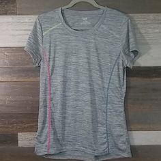 Zone Pro Ladies Workout T-Shirt. Size Medium. The Shirt Gray And Slightly Sheer. Nwt Pit To Pit Laying Flat Measures 19 Inches. Shoulder To Hem 25 Inches. Measurement Across The Hem Laying Flat 20 1/4 Inches. Bundle And Save On Shipping. 111 Gray Athleisure T-shirt For Running, Sporty Gray T-shirt For Running, Gray Short Sleeve T-shirt For Running, Gray Crew Neck T-shirt For Running, Gray Go-dry T-shirt For Workout, Sporty T-shirt For Light Exercise, Fitted Gray Go-dry T-shirt, Fitted Gray T-shirt With Go-dry, Gray Stretch T-shirt For Workout